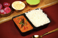 Yellow Dal Tadka Rice Box with Boondi Raita